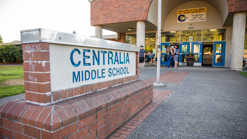 FILE PHOTO &mdash;&nbsp;Visitors gather at an entrance to Centralia Middle School during an open house event.
