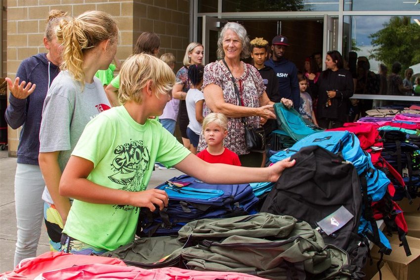 Woodland Public Schools provided hundreds of free backpacks filled with school supplies to students in need at this year&rsquo;s sixth annual Back to School Bash on Aug. 20.