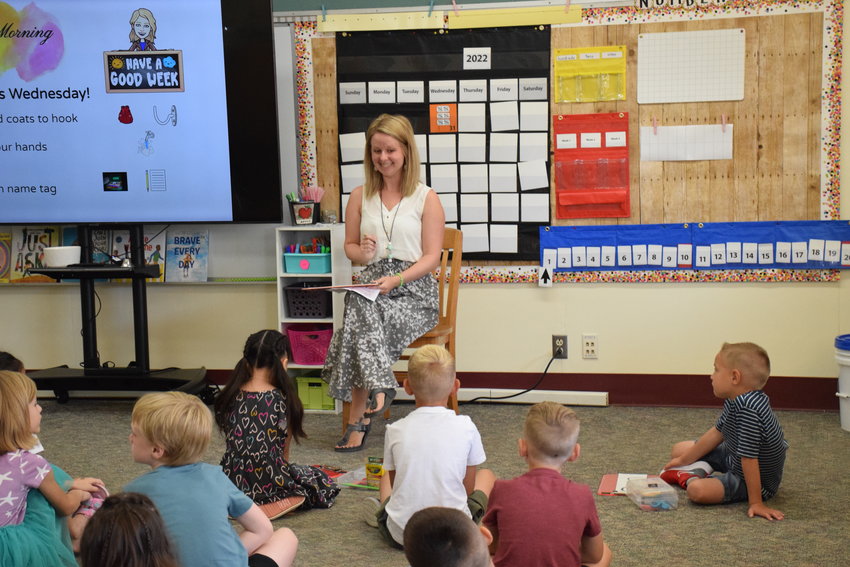 Glenwood Heights Primary School first grade teacher Sarah Auld welcomes her class for the 2022-2023 school year on the first day of school on Aug. 31.