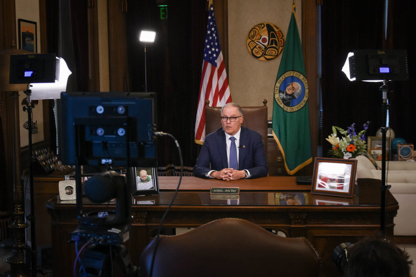 Gov. Jay Inslee delivers an address from his office during the early stages of the COVID-19 pandemic in 2020. This photo was provided by the governor&rsquo;s office.