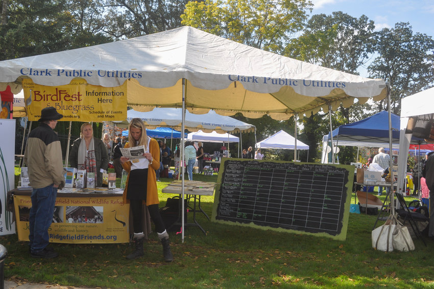 A booth for Clark Public Utilities sits at a previous BirdFest &amp; Bluegrass Festival in Ridgefield.