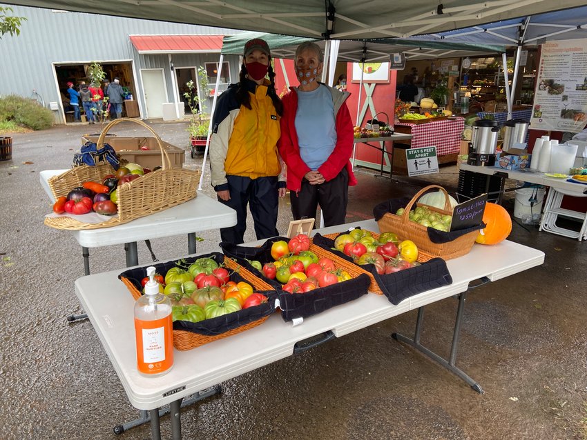Local farmers sell their tomatoes as part of a previous Harvest Celebration.