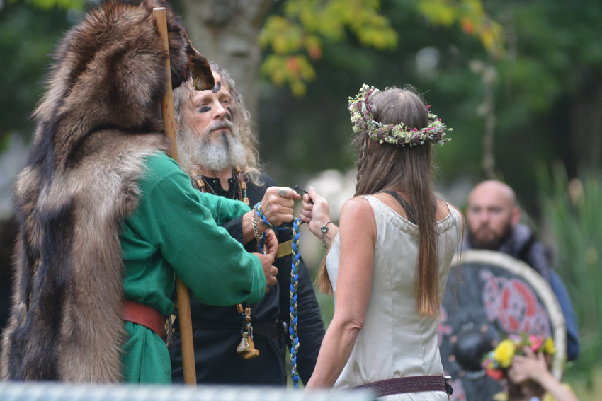 Begtam and Mardol participate in a &ldquo;handfast&rdquo; ceremony, which is a Viking tradition as old as the culture, at the Norse West Viking Festival on Sept. 11.