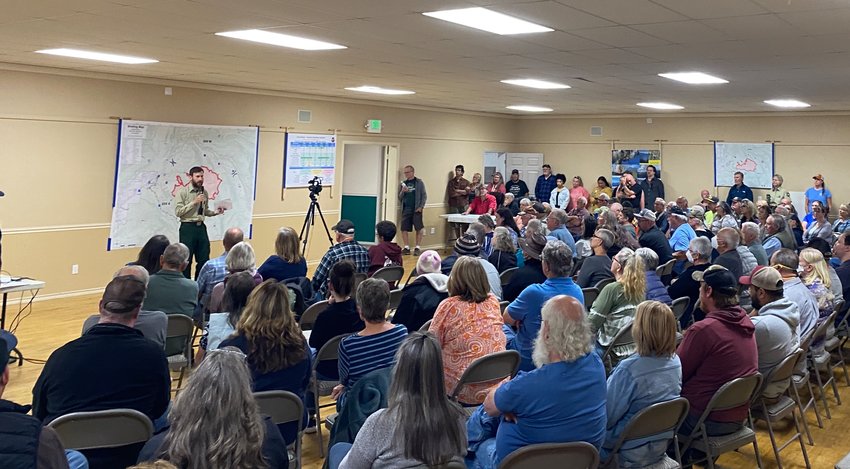 As the Goat Rocks Fire continues to cast smoke over Packwood, residents expressed fear, thankfulness and curiosity during a meeting Wednesday night at the Packwood Community Hall, where agency representatives presented status updates to at least 115 people.