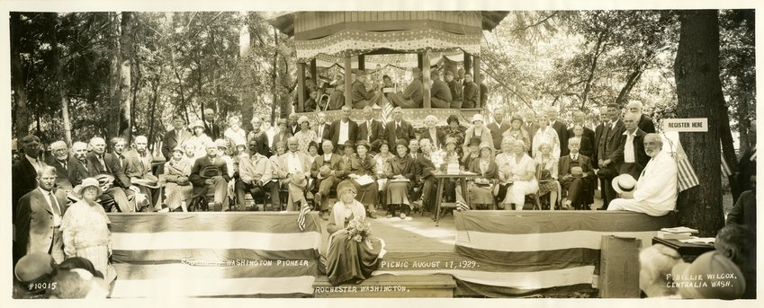 This photo is of a Southwest Washington Pioneer Picnic on Aug. 17, 1929, in Rochester. Front row center are Mr. and Mrs. A.J. Selders, from Littlerock. Mary Jane Brown (maiden name Mills) is in the center foreground of photo. She died in 1930 and was usually  &ldquo;Queen of the Pioneers&rdquo; at every picnic. Others pictured, according to the caption, include Henry Brown, Art Rowswell, Walter Eshom, Mr. Hemingway, James Fitzgerald, Billie Fitzgerald, Stacey Cooness, Mattie James, Elizabeth Young, Ivar Taume, Ed Pearce, Mr. and Mrs. James McCash, Rev. Miller, A.B.Townsend, Ann Hiaton, J. Sox Brown, Della Pearce, Ina French, Gus Bannse, Ada Johnson and Hermann Hoss.