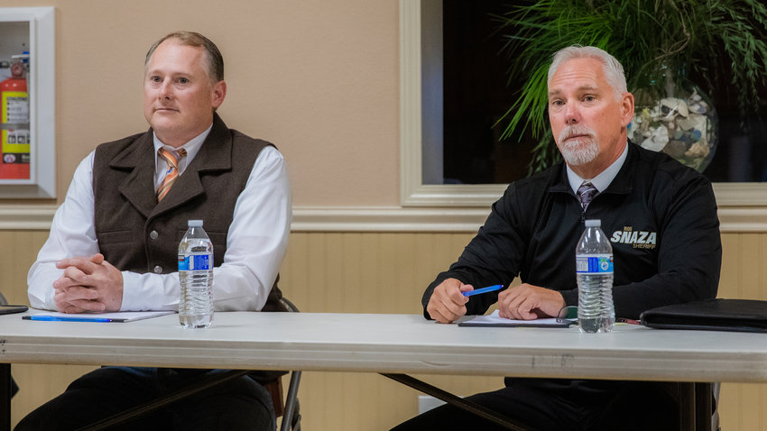 Sheriff Candidates Tracy Murphy and Rob Snaza attend a forum Thursday evening at Packwood Community Hall.