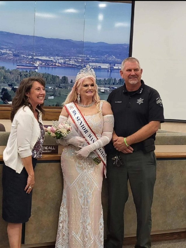 Longview Mayor MaryAlice Wallis, left, and Sheriff Brad   Thurman, right, stand with Caliatra Riesterer, center, after   she was crowned Ms. Senior Washington.