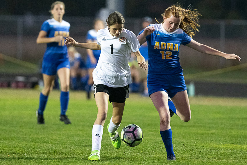 Napavine eighth-grader Ava Wilson dribbles upfield against Adna Oct. 3.