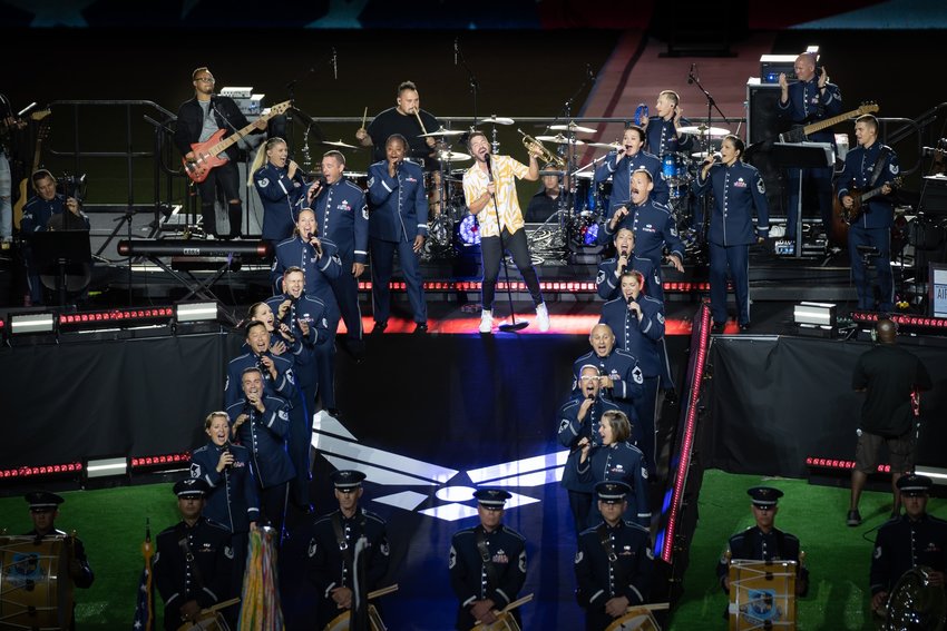 The U.S. Air Force Singing Sergeants perform during a special 75th anniversary event at Audi Field in Washington, D.C.