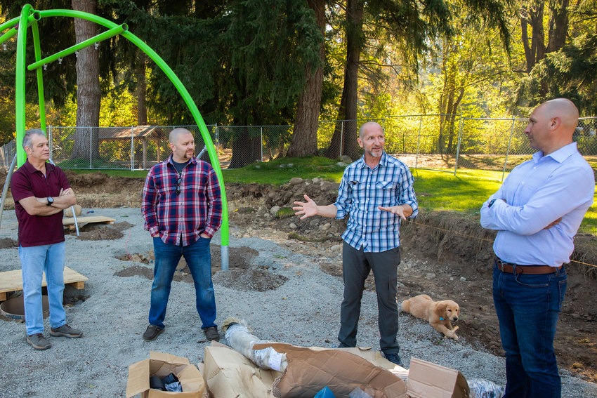Peter Tammetta, center right, owner of Highwire, Inc. a playground equipment supplier from Tacoma, talks with John O&rsquo;Callahan, Tenino Mayor Wayne Fournier and State Rep. Peter Abbarno about hardware coming to Tenino City Park during a tour on Thursday.