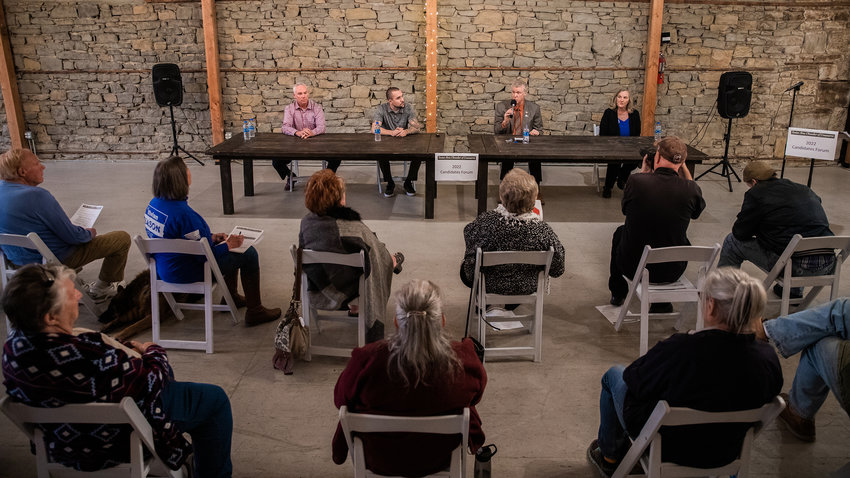 Attendees listen to speakers during the 2022 Candidates Forum hosted by the Tenino Area Chamber of Commerce Wednesday evening at The Kodiak Room.