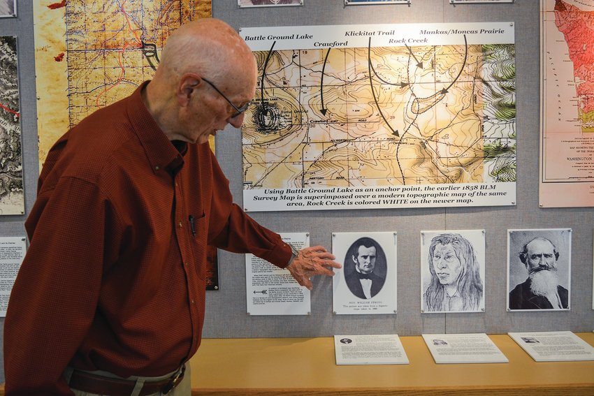 Don Higgins stands in front of his display at the Battle Ground Community Library on Oct. 20.