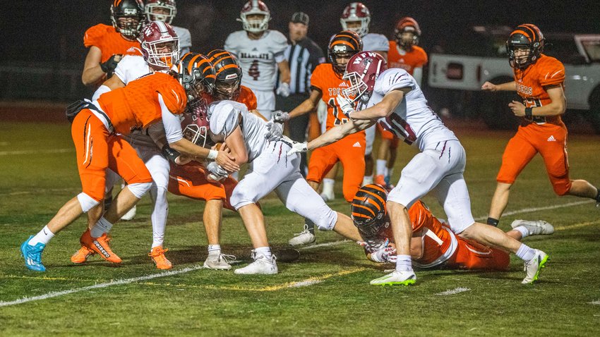 W.F. West sophomore Tucker Land (7) lowers his shoulder and crosses the goal line for a touchdown in the Bearcats' 55-7 win over Centralia on Oct. 28, 2022.