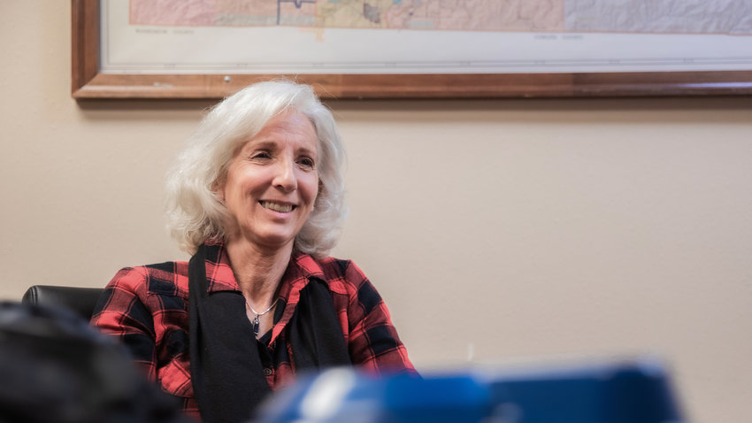 Sue Kennedy smiles while talking about her work in the community during an interview with The Chronicle at Lewis County Public Works in Chehalis in October 2022.