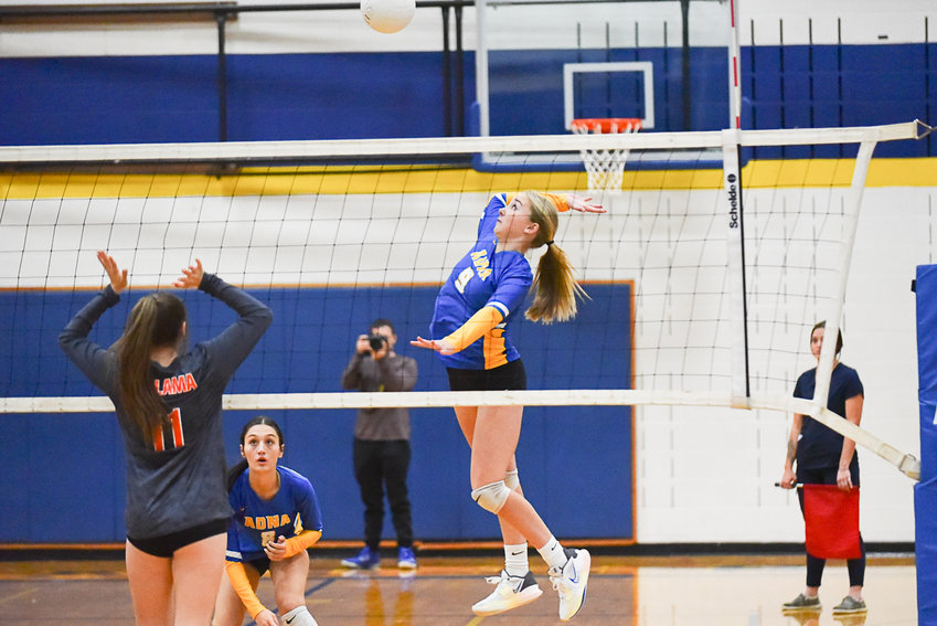 Adna's Danika Hallom goes up swinging in the first set of the Pirates' loss to Kalama in the District 4 semifinals, on Nov. 2 at Adna.