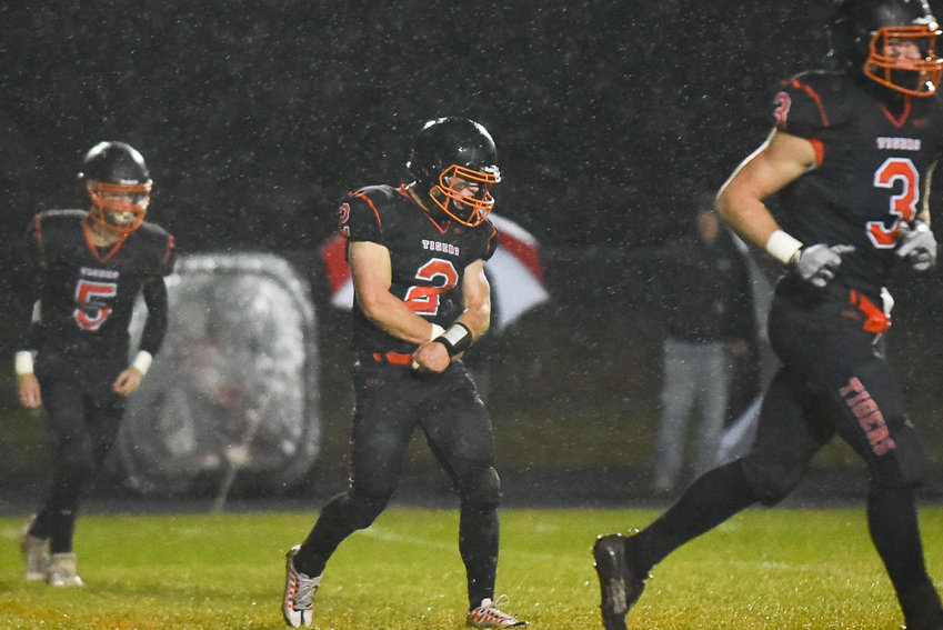 Cael Stanley celebrates a defensive stop during the first quarter of Napavine's 56-0 crossover win over Wahkiakum on Nov. 3.