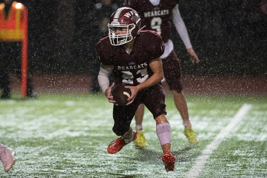 W.F. West receiver Evan Stajduhar takes a sweep for a touchdown against Woodland Nov. 4 at Centralia Tigers Stadium.