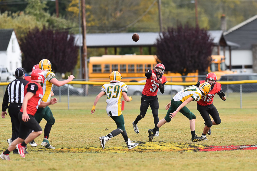 Easton Kolb sees Keegan Kolb (5) wide open over the middle of the field for a 52-yard touchdown in the first quarter of Mossyrock's 56-6 win over Darrington in the district crossover on Nov. 5.