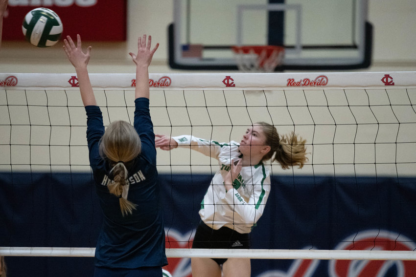Tumwater's Natalie Montoya-Kilmer rises for a spike against Hockinson in the first round of the 2A District 4 tournament at Myklebust Gym in Lower Columbia Community College Nov. 10.