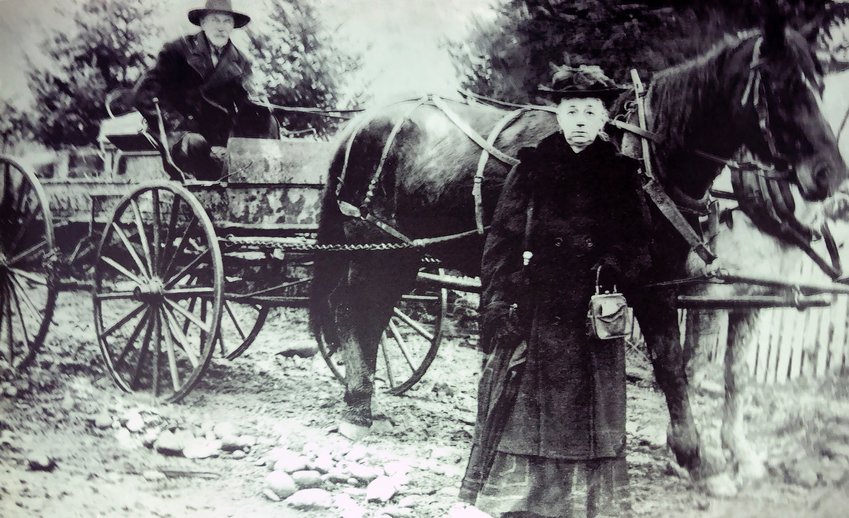 John and Louisa Hanken are pictured in this circa 1895 photo at Knab, a community about five miles east of Toledo on the way to Mount St. Helens. The Hankens immigrated from Germany in the late 1870s to settle in Knab. The couple had 15 children (one set of triplets) and raised their children on the farm in Knab. The family later moved to Toledo where John was janitor at the Coffman-Dobson Bank until he was 94. The photo is actually from an old glass negative taken by Henry Hanken, a well-known area photographer and son of John and Louisa.