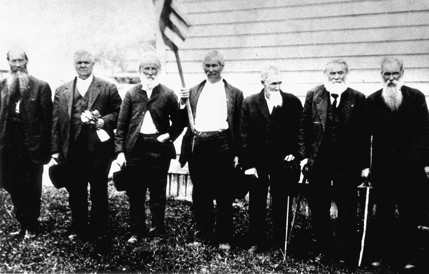 This early 1920s photo shows veterans of the Civil War. Taken in Mossyrock, from left to right, the men are William Young, Si MacFadden, Robert Daniel Silva, Dan Shaner, Robert Amaziah Sparks, Tom Landes and Andrew Jackson Kiser. Silva fought for the South and was in the Battle of Bull Run. Kiser fought for the North with Gen.W.T. Sherman. Both men moved to Ajlune sometime after the war where they became neighbors and friends. From 1893 to 1895, William Young served as the county commissioner from East Lewis County. He had a reputation of holding out for things that would benefit East County residents. Behind his back, William was known by some of the young folk of Mossyrock as &ldquo;Billy Whiskers,&rdquo; because, while driving his Dodge with its top down, his whiskers would divide on each side of his face. We also see Charles Thomas Landes in this photo. Thomas came west and established a homestead on the east side of Mossyrock. He moved west after his father, a storekeeper, was shot and killed. Between having survived the brutal Civil War, and losing his father, Tom had wanted to start anew &mdash; which is what he did. After moving to this area, Tom became a farmer and logger.