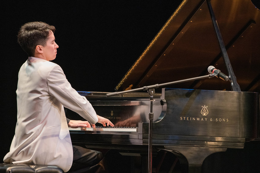 Charlie Albright performs for an audience on a nine-foot Steinway &amp; Sons grand piano inside the Corbet Theatre Friday evening with proceeds going to the Charlie Albright Scholarship at Centralia College.