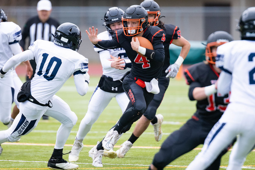 Napavine quarterback Ashton Demarest makes his case for the Heisman during the first quarter of the Tigers' 49-6 blowout of Chewelah at Tumwater on Nov. 26, 2022.
