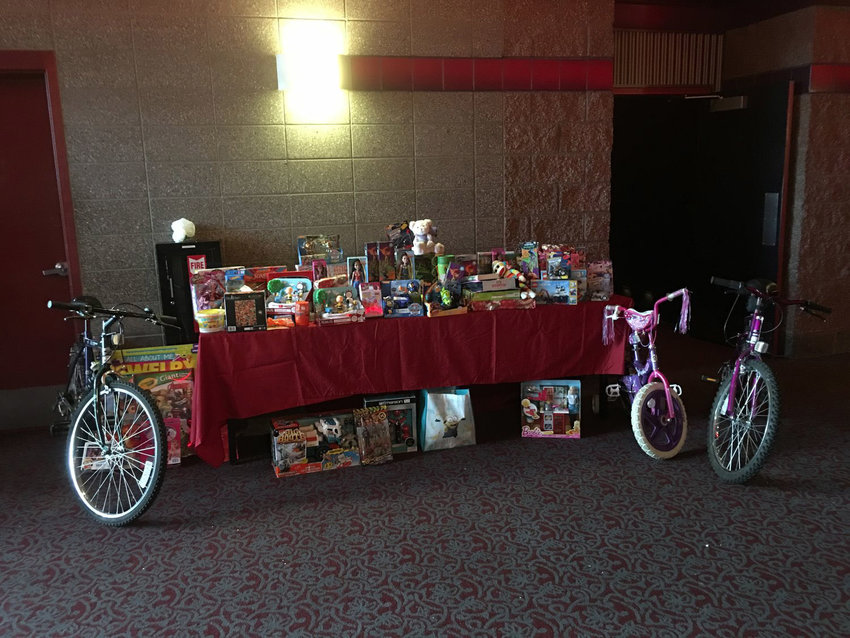 Toy donations for Yelm Community Services sit on display at a prior free movie and toy drive event. This year's event put on by the Yelm Midday Lions Club at Yelm Cinemas will take place on Saturday, Dec. 10.