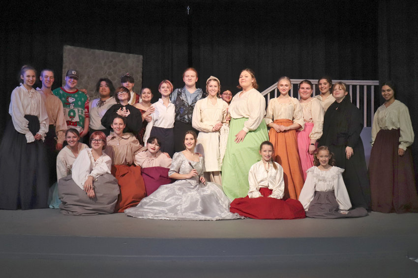 The cast of W.F. West High School&rsquo;s production of Cinderella poses for a photo on stage at the school&rsquo;s theater in Chehalis on Tuesday. A full story on W.F. West High School&rsquo;s winter musical will be published in the Saturday, Dec. 10, edition of The Chronicle.&nbsp;