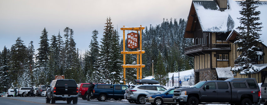 Cars line up outside of the White Pass Ski Lodge in December 2022.