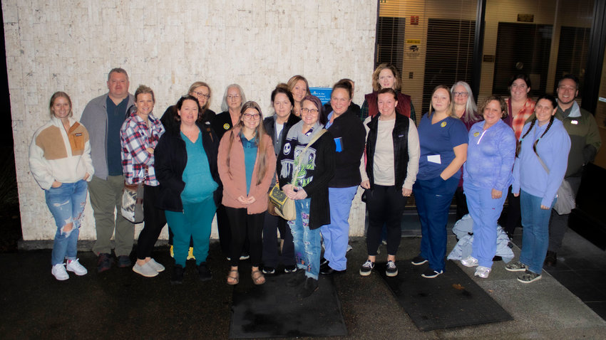 A group of nurses from Providence Centralia Hospital pose outside Chehalis City Hall after some of them spoke during the public comment period of the Chehalis City Council&rsquo;s regular meeting on Monday night. The nurses asked the council for support for better staffing and addressing safety concerns.