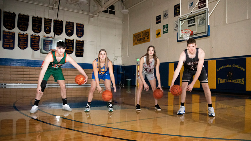 From left, MWP&rsquo;s Josh Salguero, Adna&rsquo;s Karlee VonMoos, and W.F. West&rsquo;s Juila and Soren Dalan dribble basketballs and pose for a photo in the Centralia College gymnasium on Tuesday.