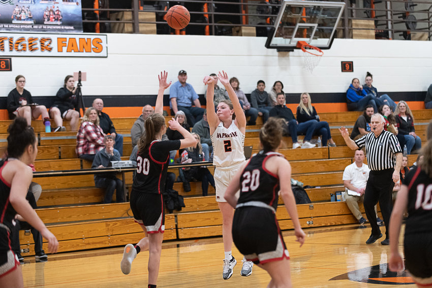 Jessie McCoy shoots a 3-pointer during the second quarter of Napavine's win over Toledo on Dec. 13.