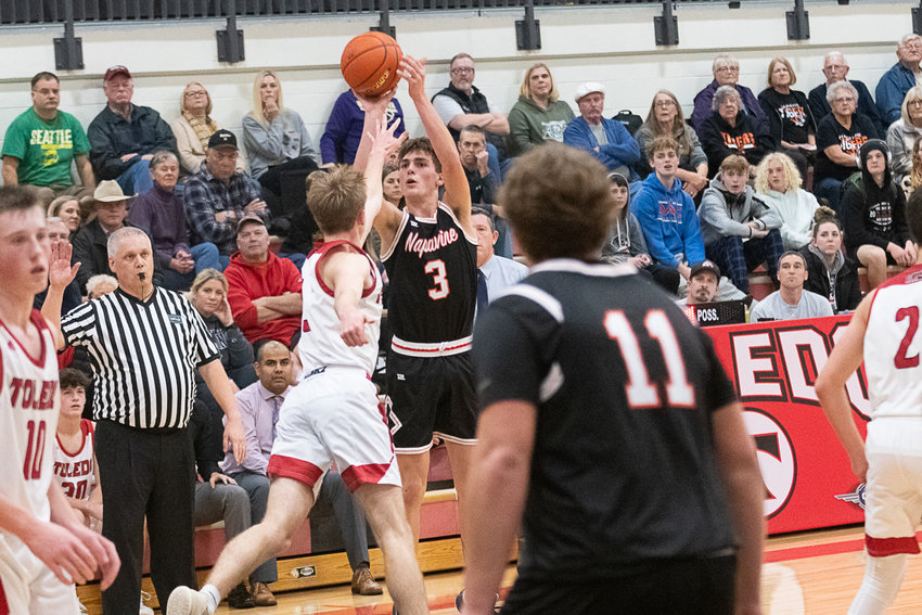 James Grose launches a 3-pointer during the second quarter of Napavine's 59-47 win at Toledo on Dec. 15.