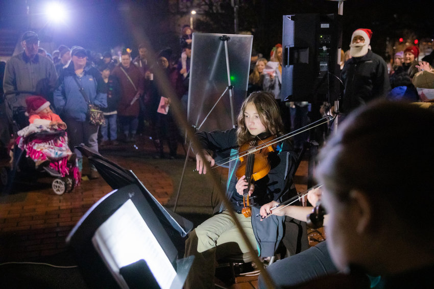 Members of the Centralia High School and Centralia Middle School orchestra bands perform &ldquo;Jingle Bells&rdquo; at George Washington Park before a Christmas Tree Lighting celebration last month.