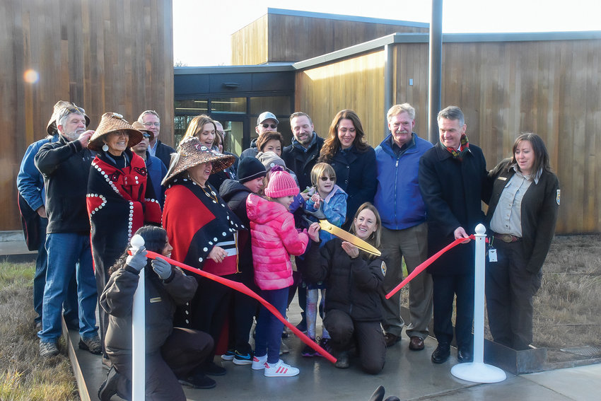 The ribbon for the new Ridgefield National Wildlife Refuge administrative building is cut during a ceremony on Dec. 16.