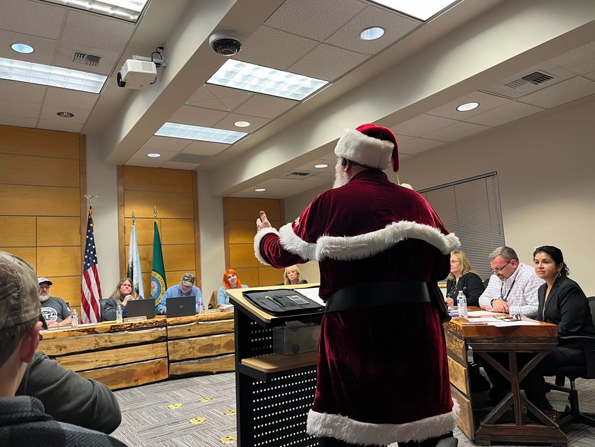 Harry Miller, otherwise known as Santa Claus, speaks at the Yelm City Council meeting on Tuesday, Dec. 13.