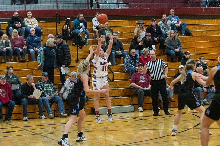 Lena Fragner shoots from distance during the first half of W.F. West's 65-36 win over Mark Morris on Dec. 20.