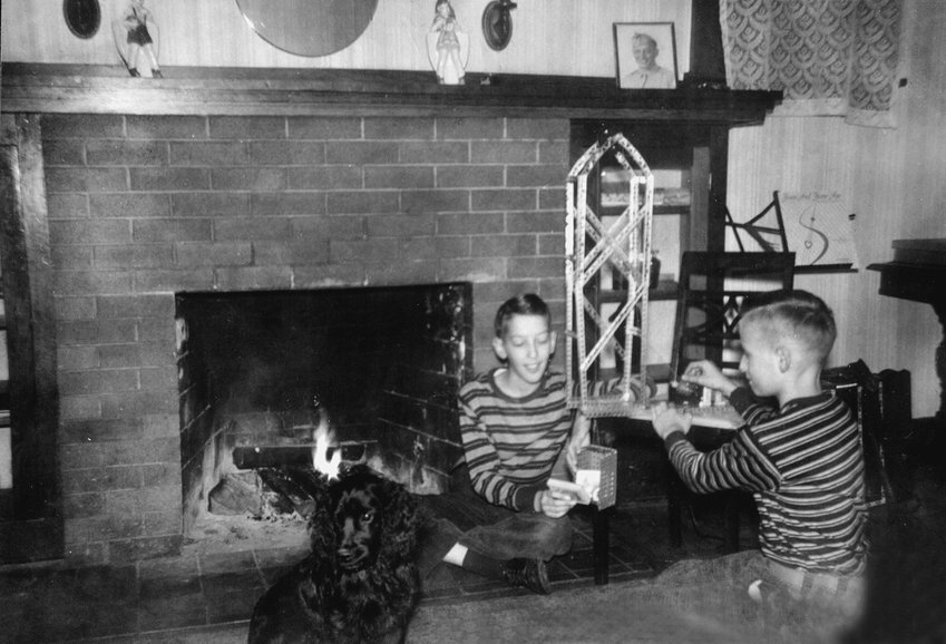 PHOTO OF THE WEEK: Bill and Dan Logan are pictured with an early Christmas present &mdash; an erector set. They&rsquo;re shown in this 1947 photo with their dog, Blackie. The early gift was a result of the fact that James W. Logan, their father, was shipped out to Korea. The boys and their dog are in front of the fireplace at their home at 1004 S. Tower Ave. in Centralia.