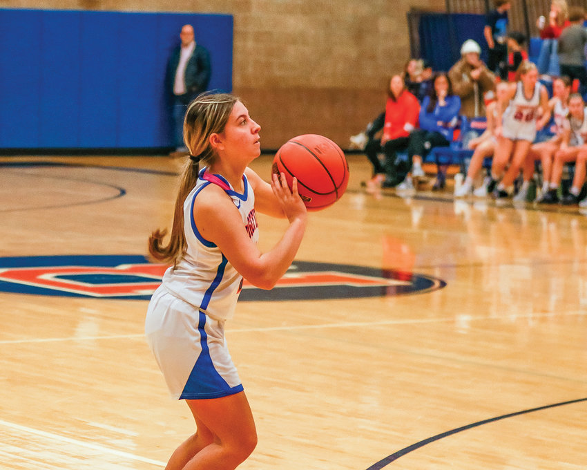 Ridgefield&rsquo;s Kylie Andrew attempts a three pointer during a game against La Center on Monday, Dec. 19.
