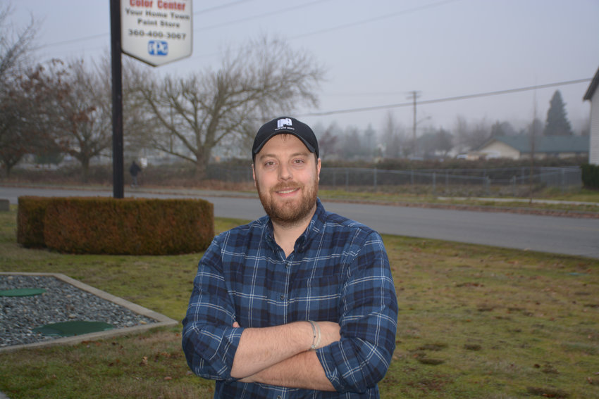 Jared Potter poses for a photo outside of the Nisqually Valley News office in Yelm on Monday, Jan. 2.