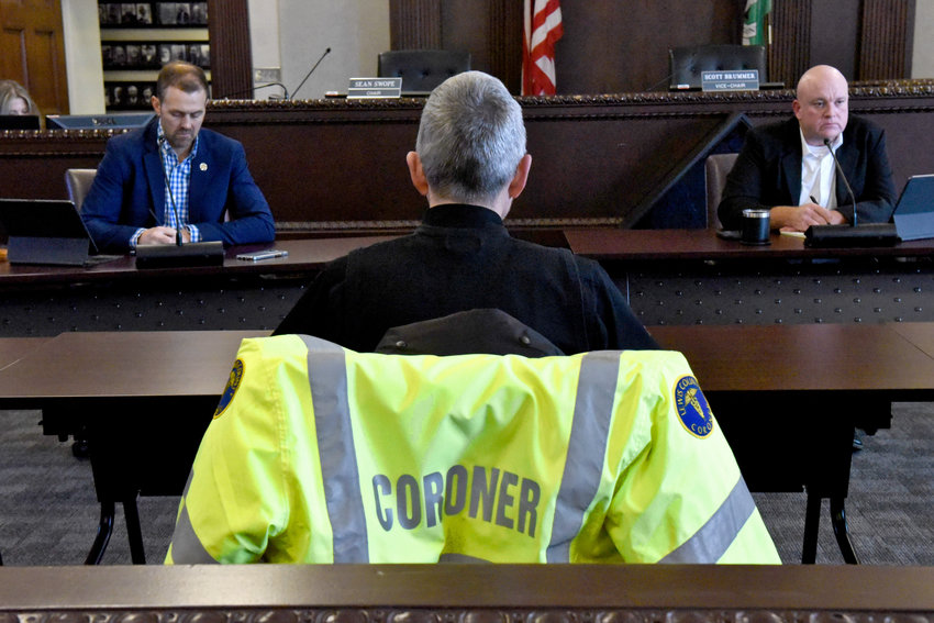 Lewis County Chief Deputy Coroner Steven Wilson joins Coroner Warren McLeod in presenting the 2022 death totals to the Lewis County Board of Commissioners on Tuesday.