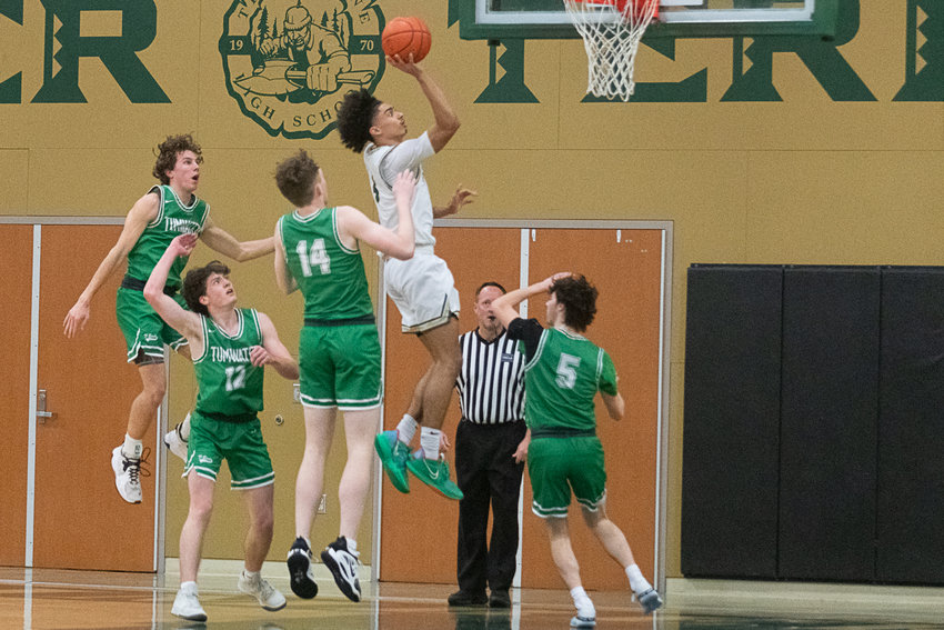 Timberline star and UNLV commit Brooklyn Hicks soars past a majority of the Tumwater defense for a bucket during the Blazers' 74-58 win over the T-Birds on Jan. 3.