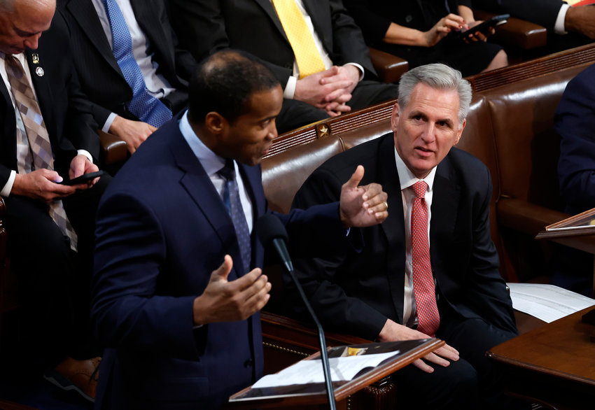 U.S. Rep.-elect John James, R-Mich., delivers remarks alongside House Republican Leader Kevin McCarthy, R-Calif., right, in the House Chamber during the third day of elections for Speaker of the House at the U.S. Capitol Building on Jan. 5, 2023, in Washington, D.C. The House of Representatives is meeting to vote for the next speaker after McCarthy failed to earn more than 218 votes on several ballots. (Chip Somodevilla/Getty Images/TNS)