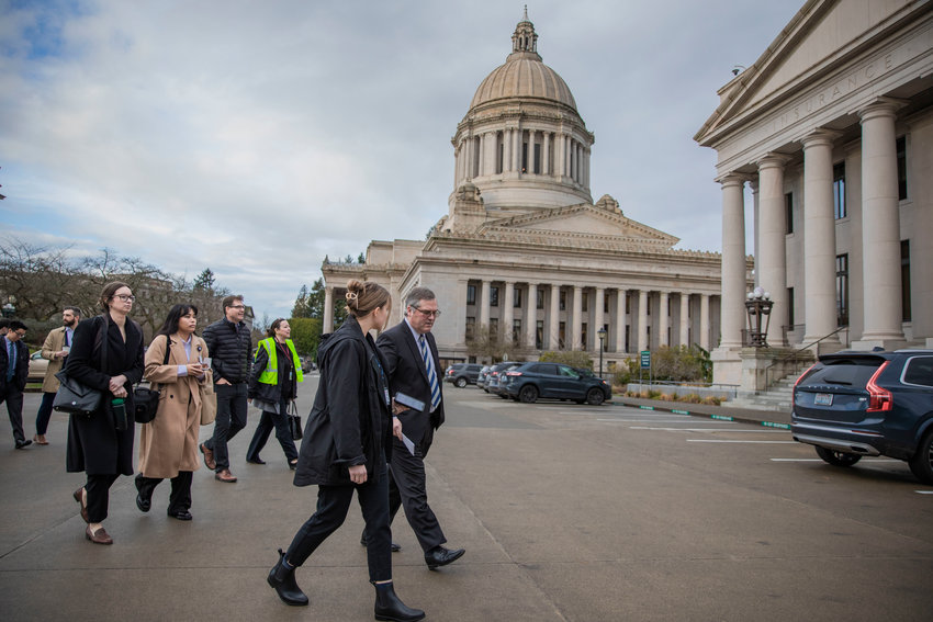 State Rep. J.T. Wilcox, R-Yelm, walks outside the Washington State Capitol Building in Olympia earlier this month.