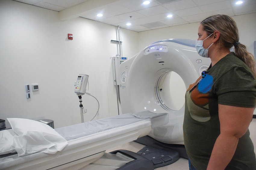 Vital Care imaging technician Kristin Bishop oversees a computerized tomography (CT) scan machine at Vital Care&rsquo;s office on Jan. 5.