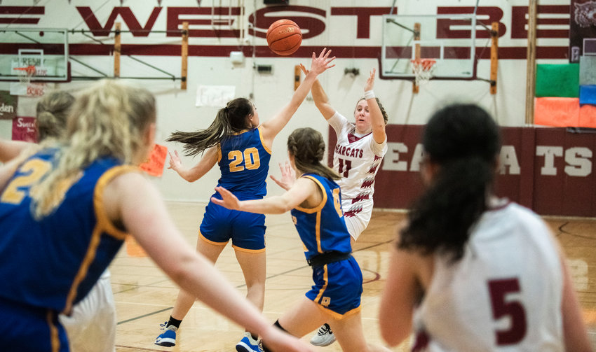W.F. West&rsquo;s Lena Fragner (11) looks to pass during a game against Rochester in Chehalis on Jan. 5.
