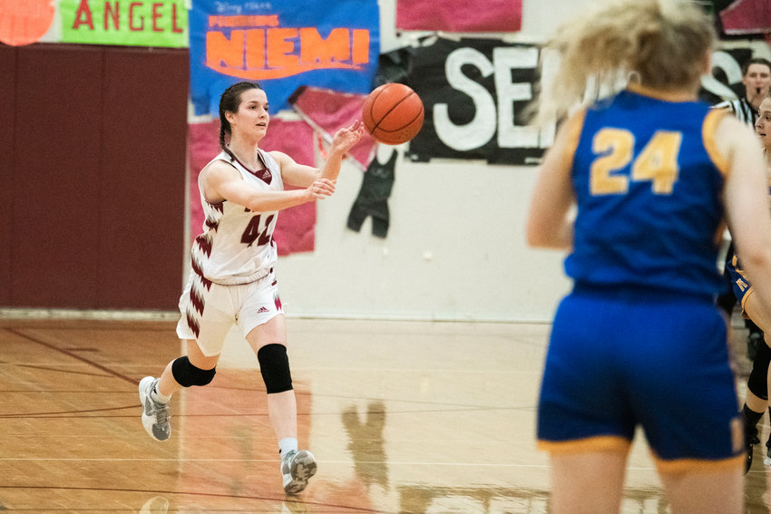 W.F. West&rsquo;s Amanda Bennett (42) makes a pass during a game against Rochester in Chehalis Thursday night.