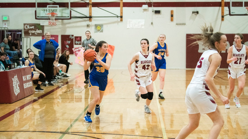Rochester&rsquo;s Roisin Stull (30) looks to pass during a game against W.F. West in Chehalis on Jan. 5.