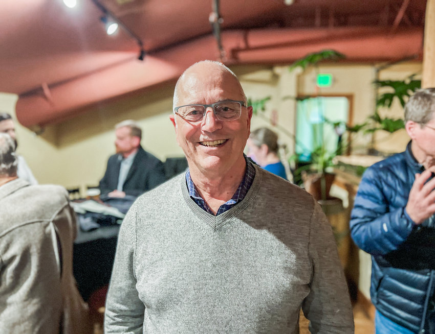 Jim Kramer smiles for a photo at his going away party after a decade in the Chehalis Basin process as a facilitator.